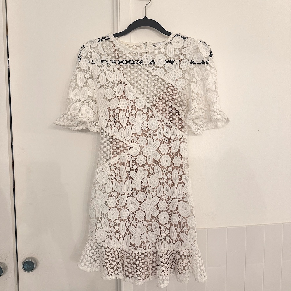 White lace mini dress with nude slip underneath